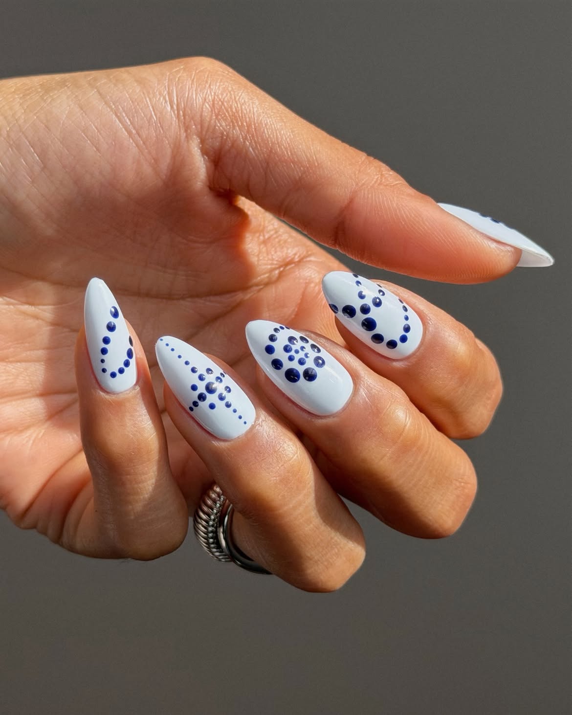 White & Navy Polka Dot Stiletto Nails