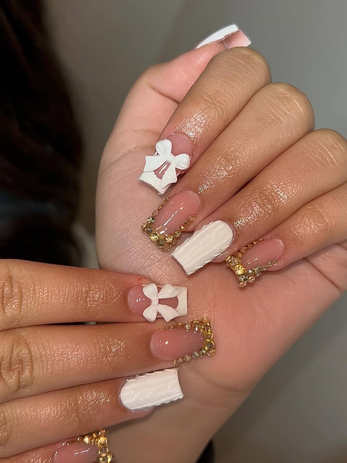 3D Bow and Gold Rhinestone French Tip Nails