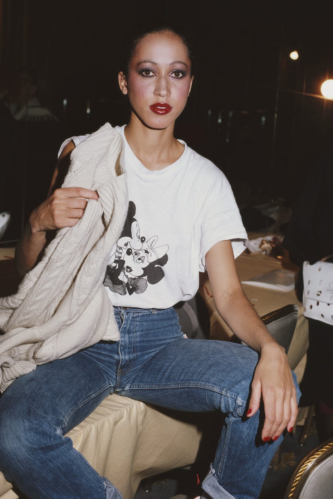 High-Waisted Jeans with Graphic Tee and Sweater High-Waisted Jeans with Graphic Tee and Sweater — 80s Style