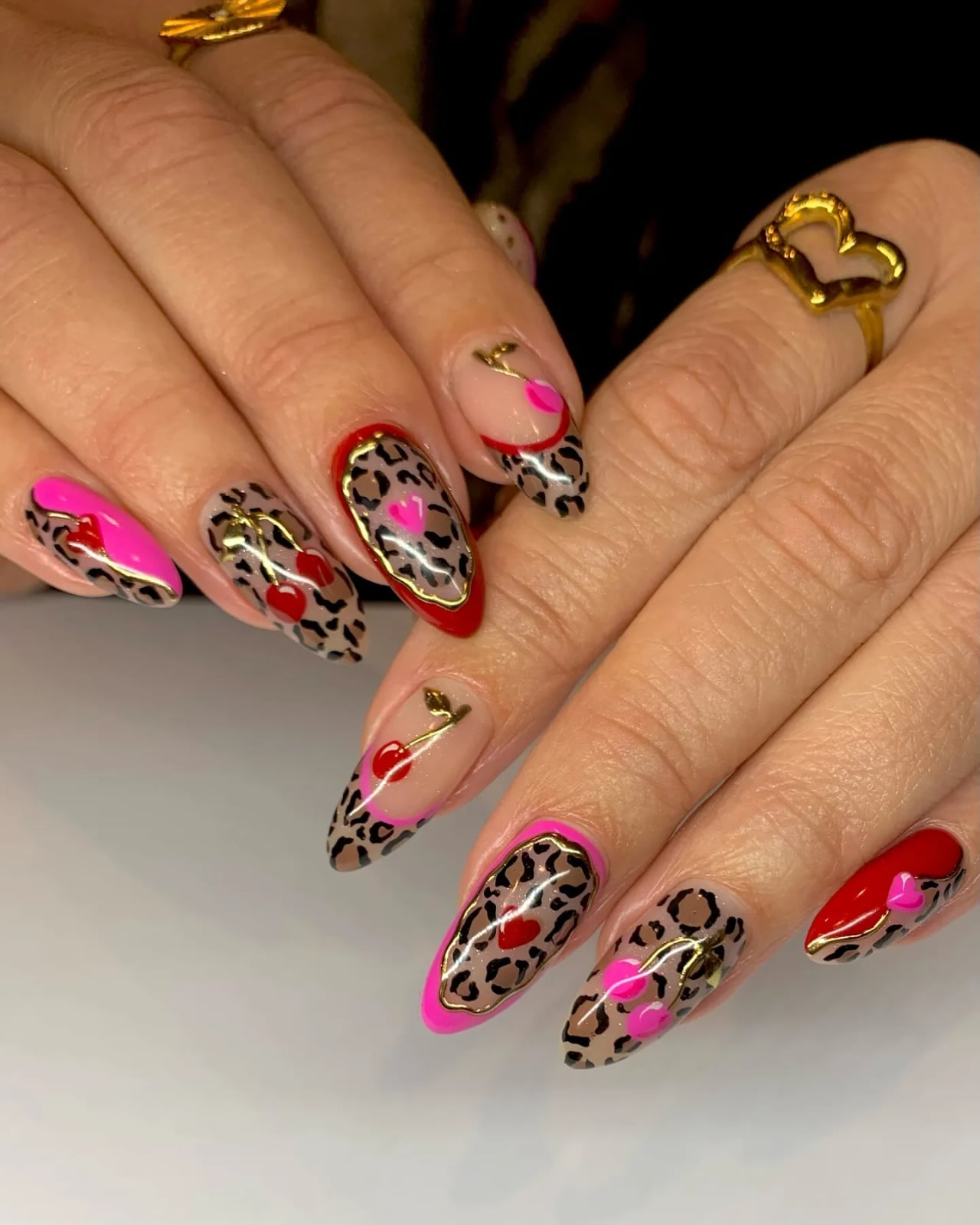 Mixed Animal Prints with Glitter and Gold Accents Mixed Animal Prints with Glitter and Gold Accents — Animal Print Nails