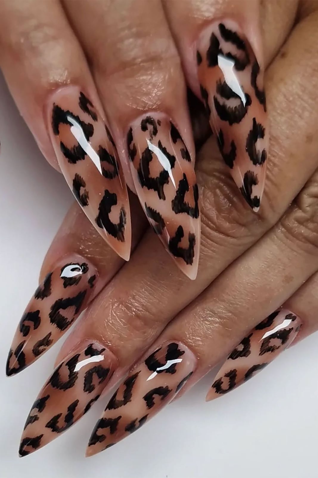 Long Stiletto Glossy Nude Base Black and Brown Leopard Print Long Stiletto Glossy Nude Base Black and Brown Leopard Print — Animal Print Nails