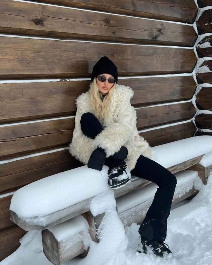 Shearling Coat Over Black Flare Pants Shearling Coat Over Black Flare Pants — Apres Ski Outfits