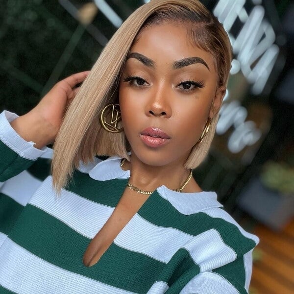 Platinum Blonde Asymmetrical Bob With Dark Roots Platinum Blonde Asymmetrical Bob With Dark Roots