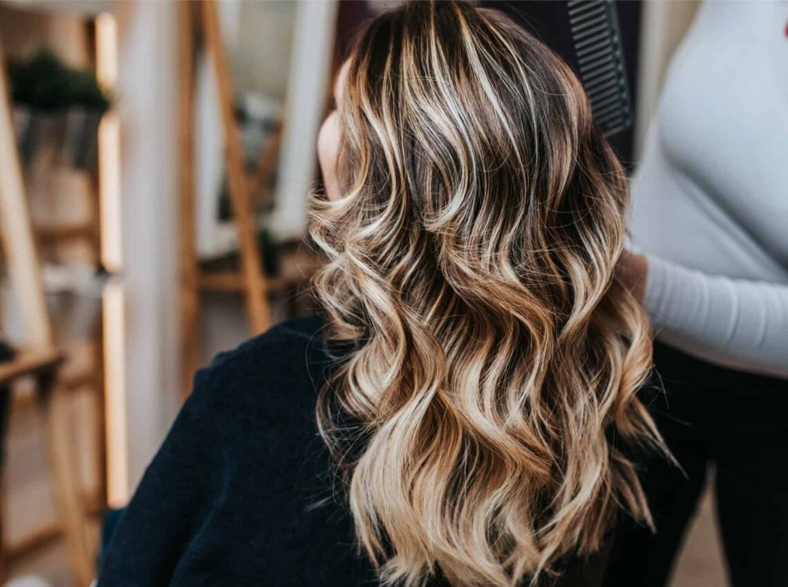 Chin Length Angled Bob With Side Swept Bangs — Balayage Hair
