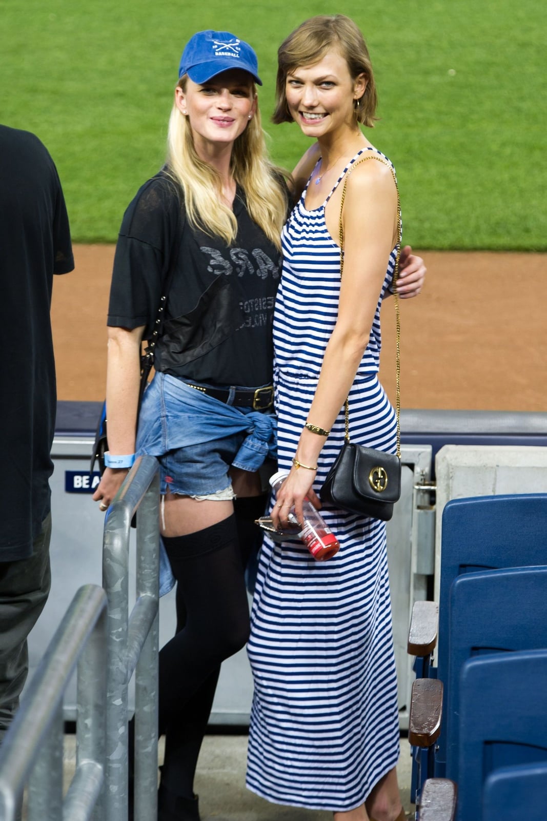 Graphic T-shirt With Denim Shorts Tied At Waist And Stockings — Baseball Game Outfits