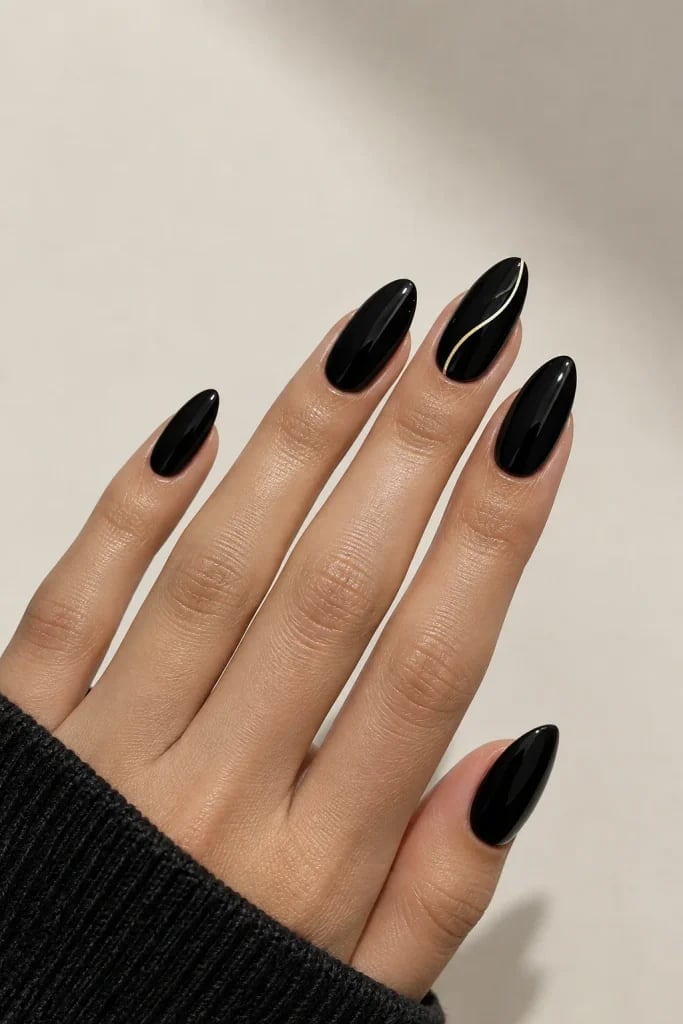 Glossy Black Almond With Thin Gold Line Glossy Black Almond With Thin Gold Line — Black Almond Nails