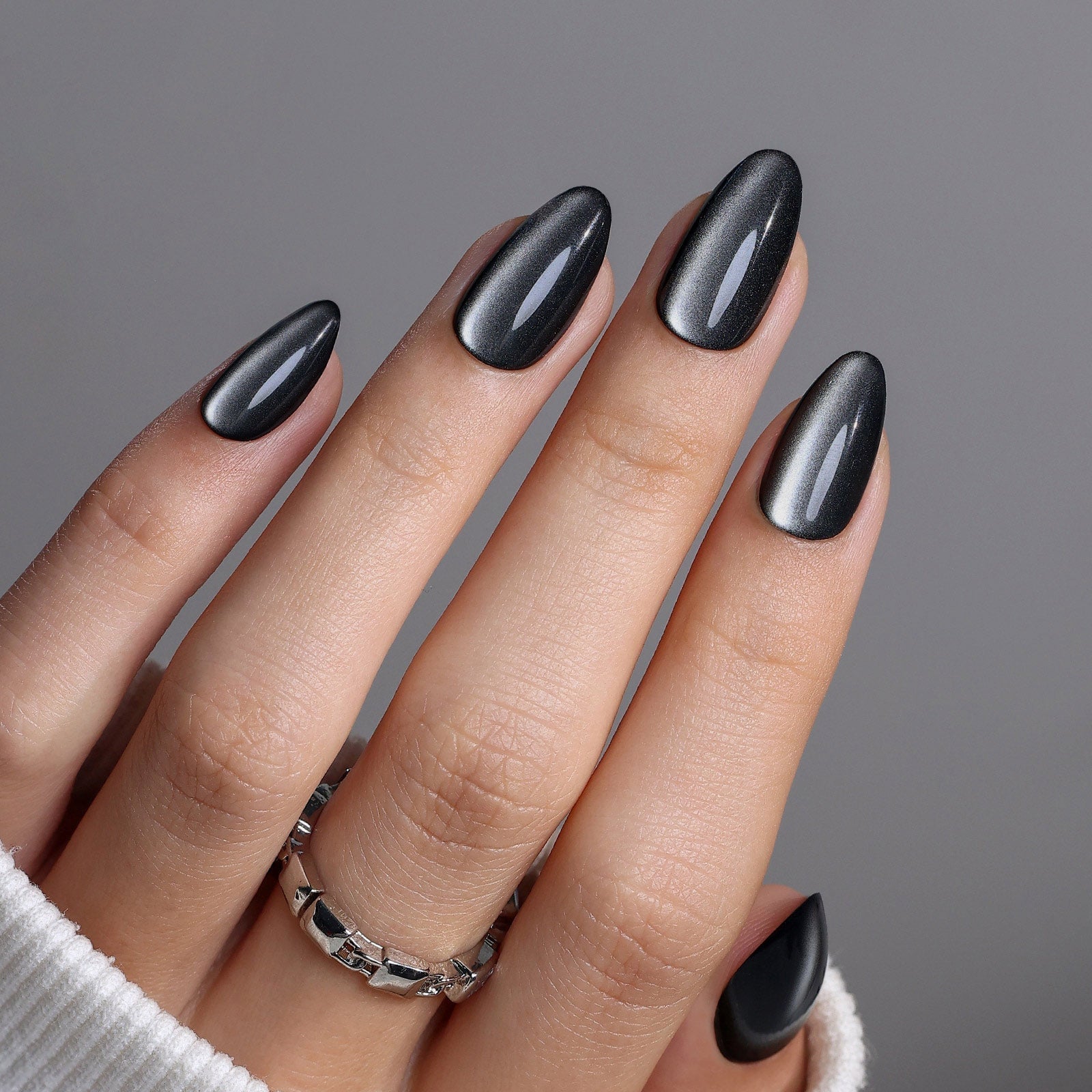 Short Black Cat-Eye Almond Nails Short Black Cat-Eye Almond Nails — Black Almond Nails