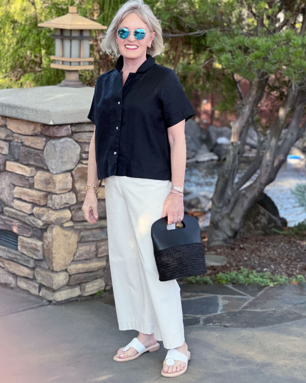 A Black Shirt with White Wide-Leg Trousers and White Sandals A Black Shirt with White Wide-Leg Trousers and White Sandals — Black and White Outfits