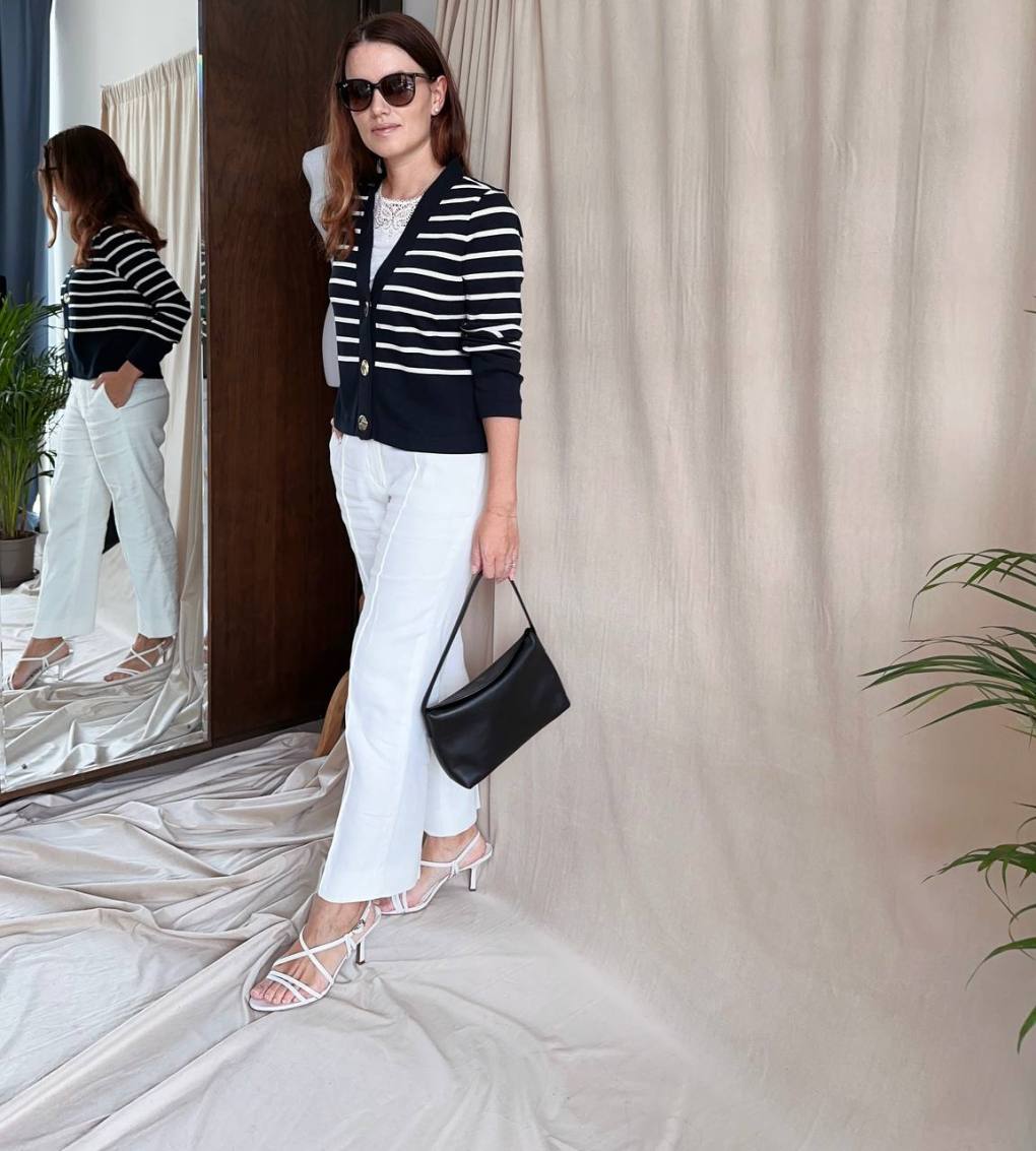A Striped Cardigan Over a White Top with White Trousers A Striped Cardigan Over a White Top with White Trousers — Black and White Outfits