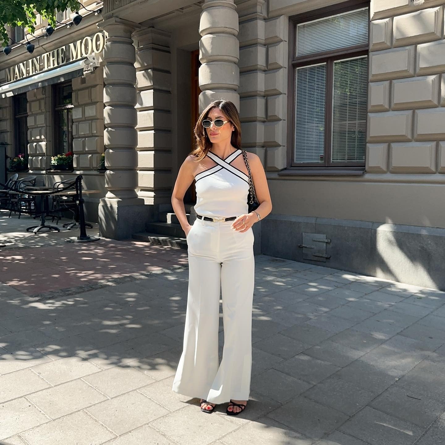 A White Halter Top with Black Trim and Wide-Leg, Close-Up Take A White Halter Top with Black Trim and Wide-Leg, Close-Up Take — Black and White Outfits