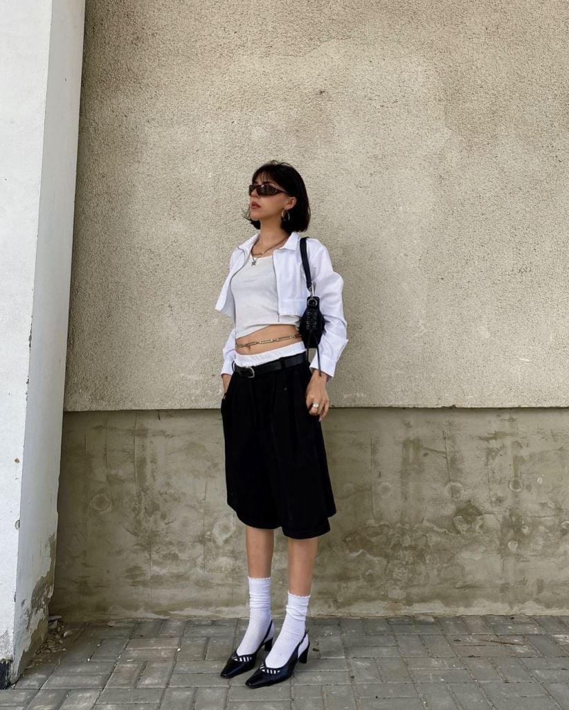 Black Wide-Leg Shorts with a White Cropped Shirt, Close-Up Take Black Wide-Leg Shorts with a White Cropped Shirt, Close-Up Take — Black and White Outfits
