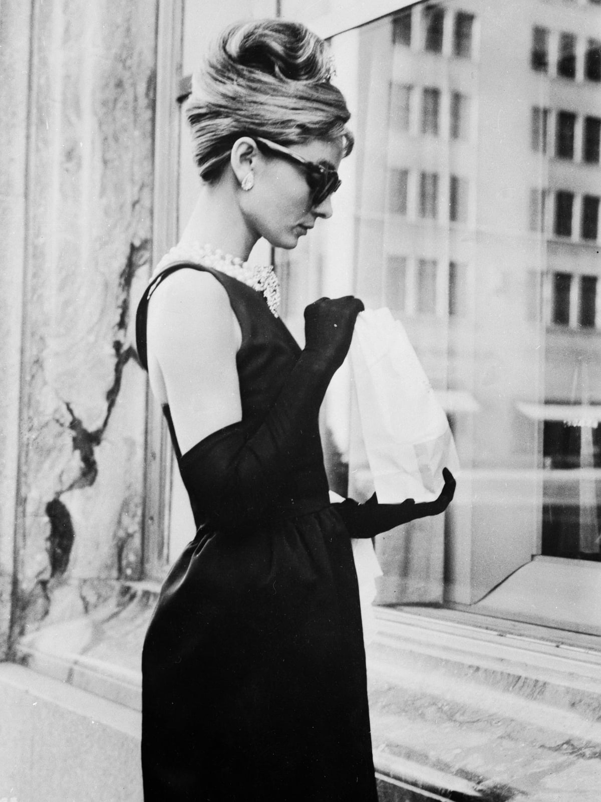 An Iconic Black Sleeveless Dress with Long Black Gloves, Close-Up Take An Iconic Black Sleeveless Dress with Long Black Gloves, Close-Up Take — Black and White Outfits