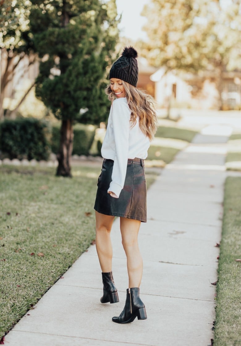 Black Block Heel Ankle Boots With Faux-Leather Skirt, Close-Up Take Black Block Heel Ankle Boots With Faux-Leather Skirt, Close-Up Take — Black Boots Outfit