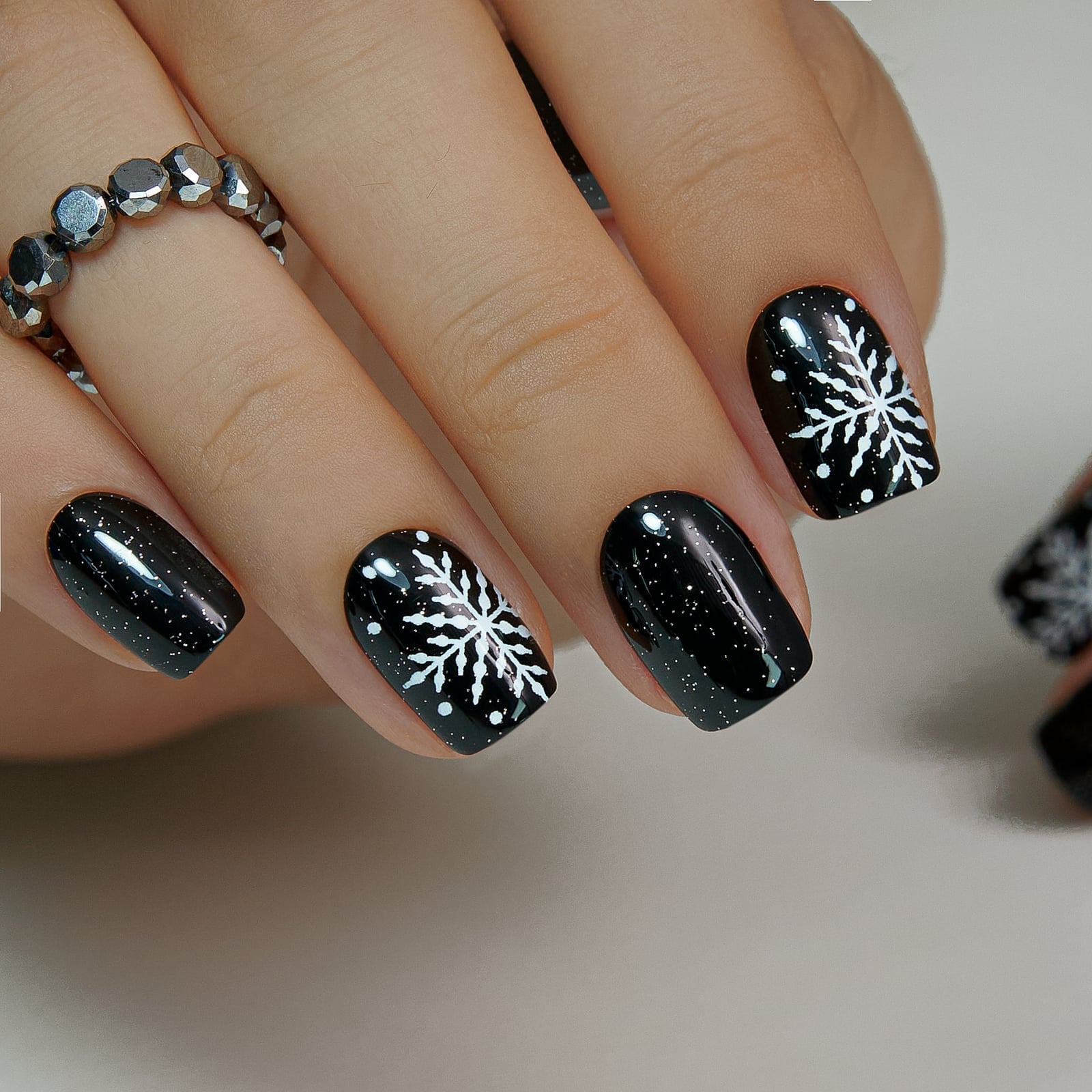 Glossy Black With Subtle Glitter Snowflakes Glossy Black With Subtle Glitter Snowflakes — Black Christmas Nails