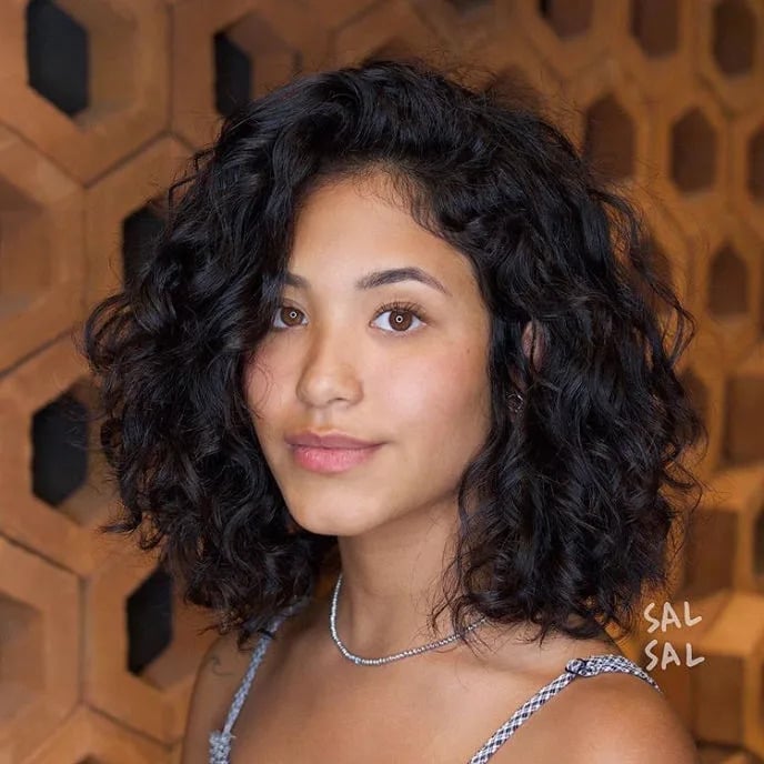Collarbone Length With Subtle Layers Collarbone Length With Subtle Layers — Black Curly Hair