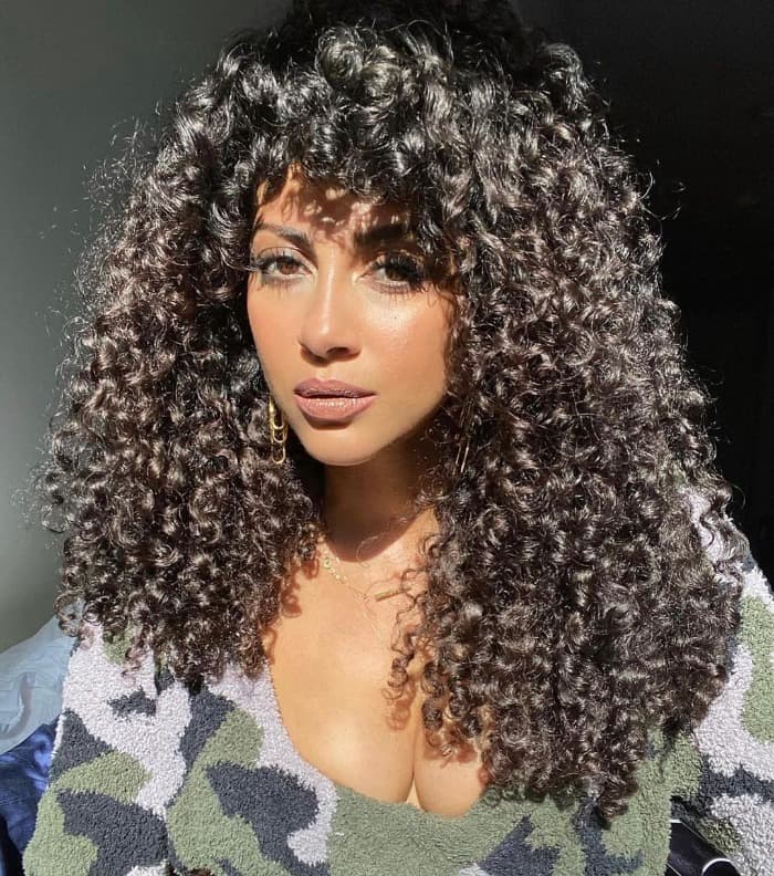 Mid-Back Layers With Full Fringe Mid-Back Layers With Full Fringe — Black Curly Hair