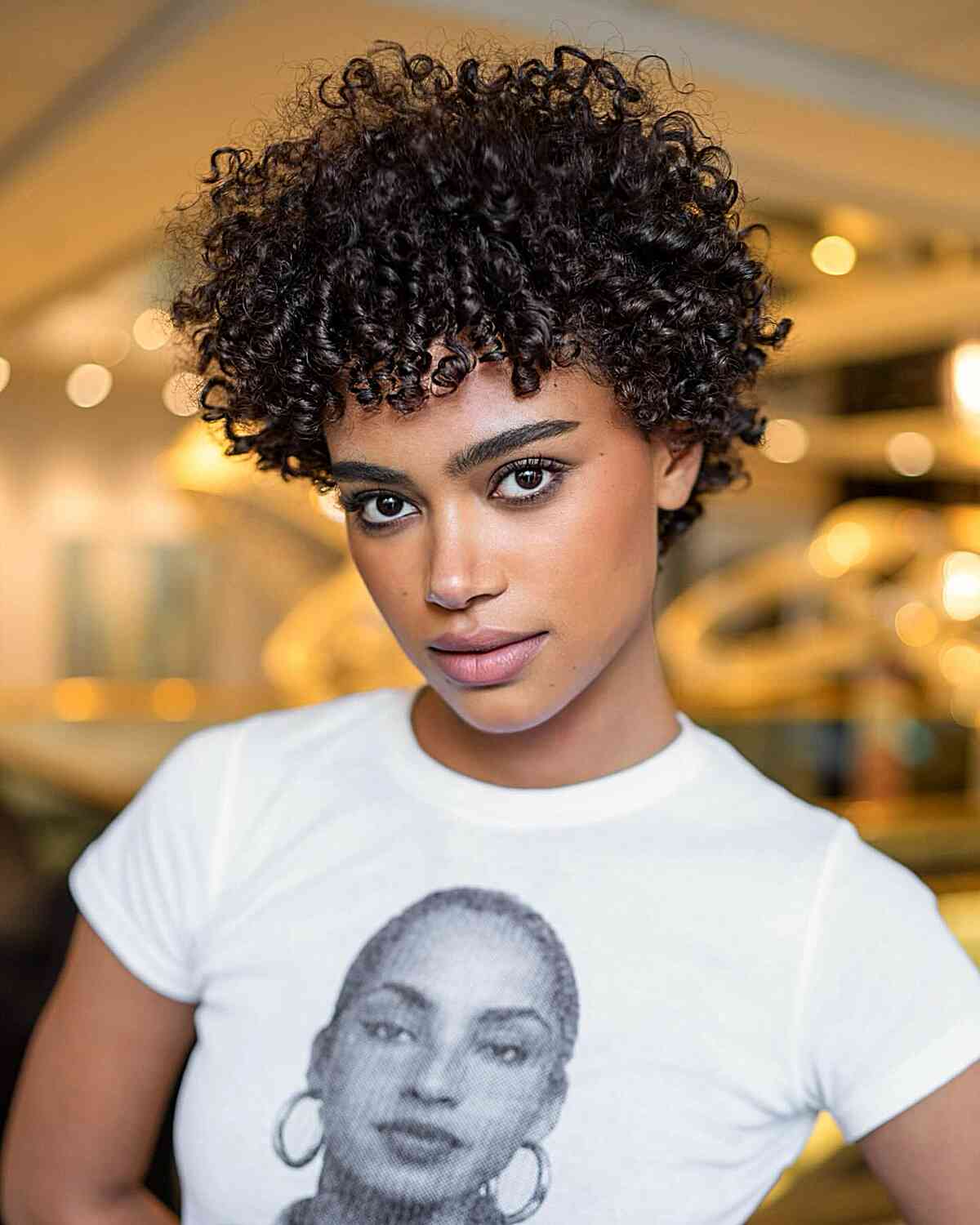 Short Pixie With Tightly Coiled Bangs Short Pixie With Tightly Coiled Bangs — Black Curly Hair