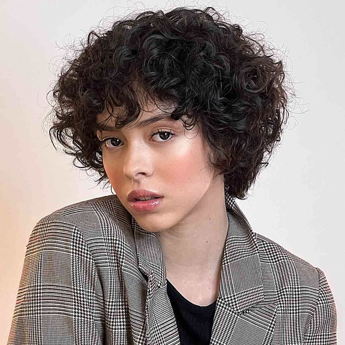 Short Layered Cut With Textured Bangs Short Layered Cut With Textured Bangs — Black Curly Hair