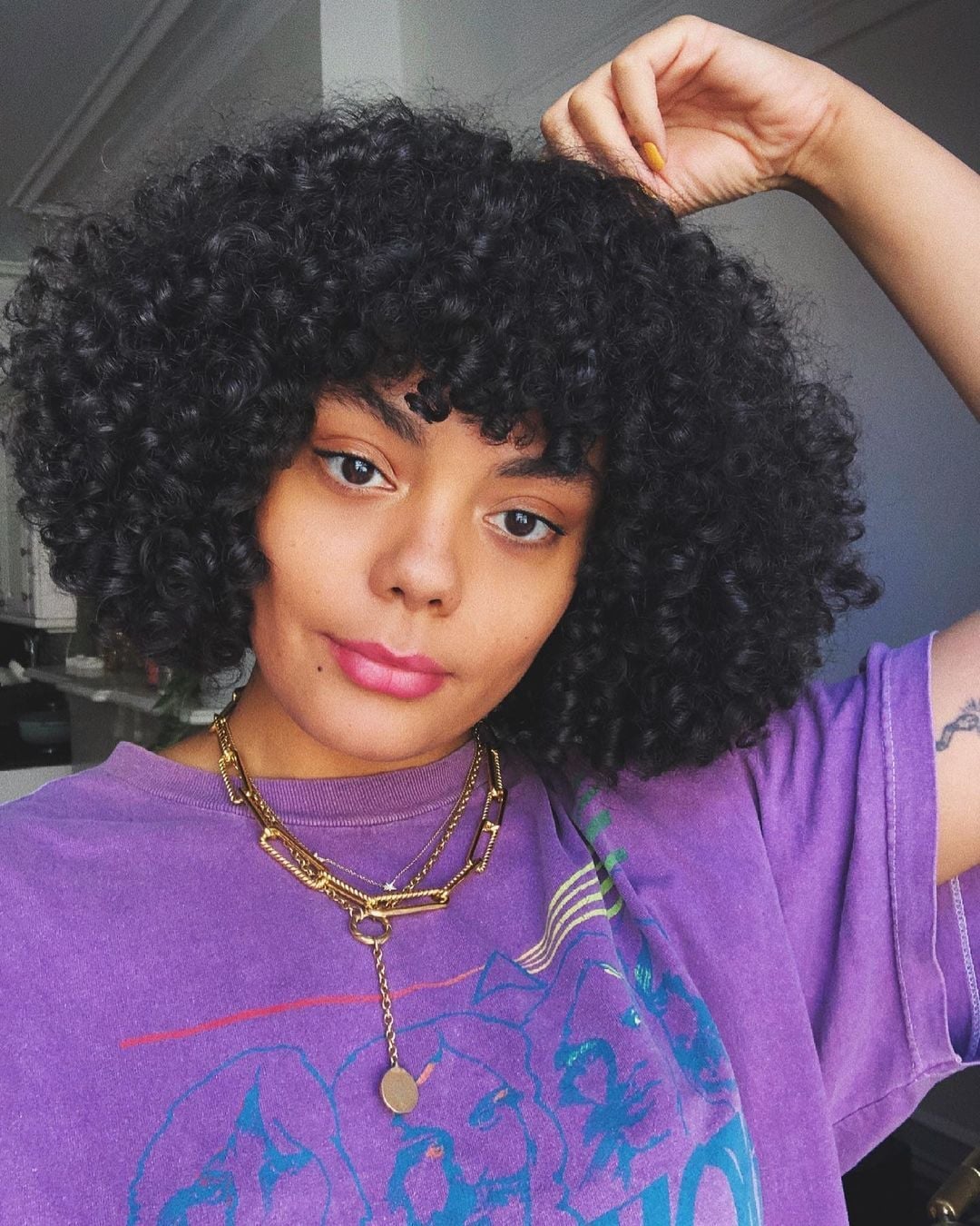 Chin Length Bob With Wispy Bangs Chin Length Bob With Wispy Bangs — Black Curly Hair
