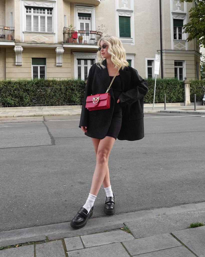 Chunky Black Loafers with Mini Dress and Bomber Jacket — Black Loafers Outfit