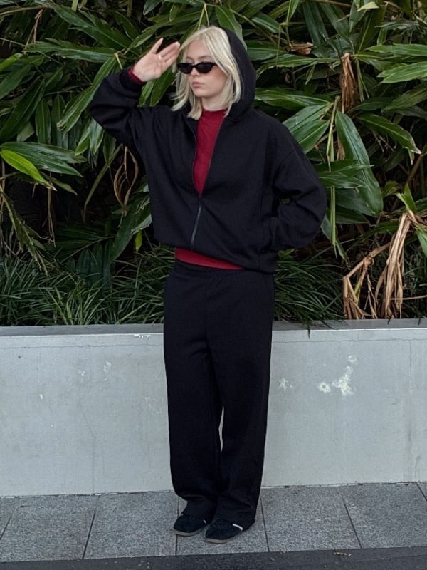 Pop of Color With Red T-Shirt Under Hoodie — Black Sweatpants Outfit