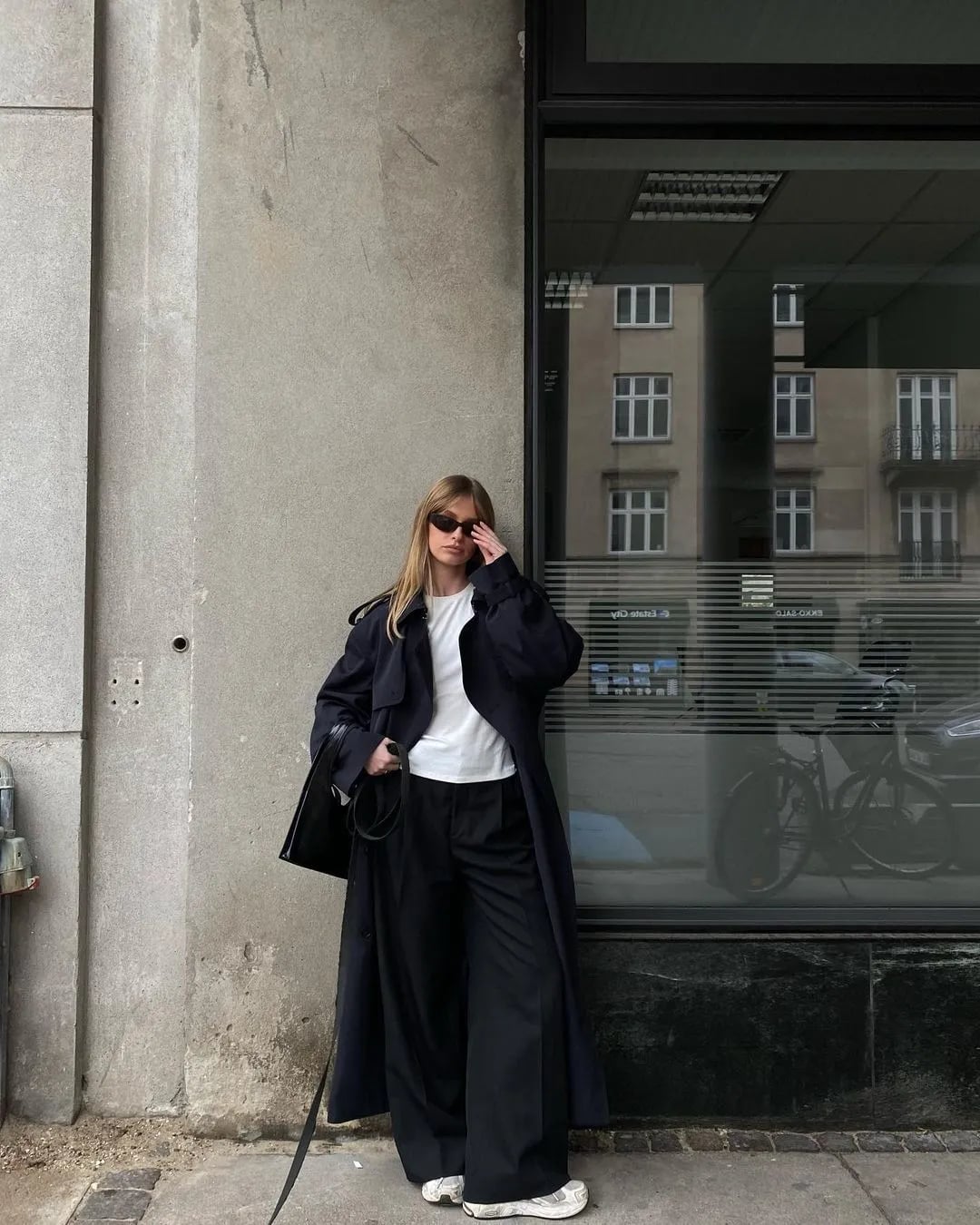 Oversized Black Trench Coat with White Sneakers, Close-Up Take — Black Trench Coat Outfit
