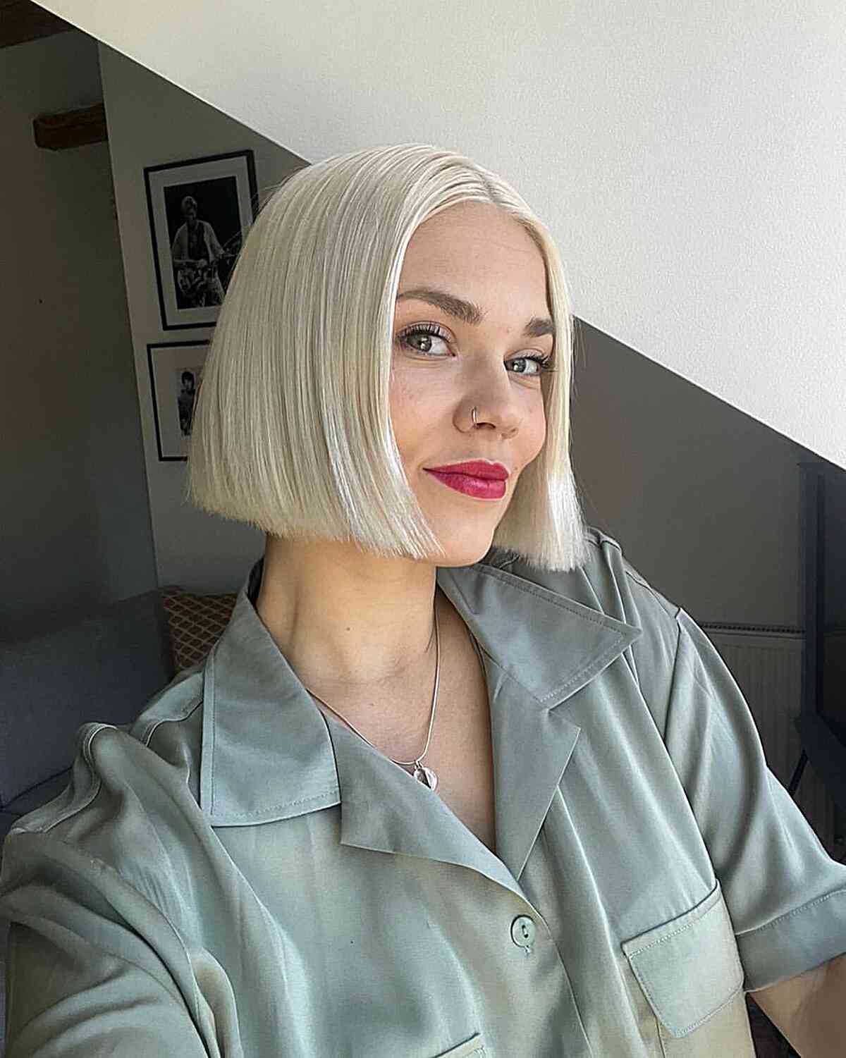 Sharp Platinum Bob With Blunt Bangs — Blonde Short Hair