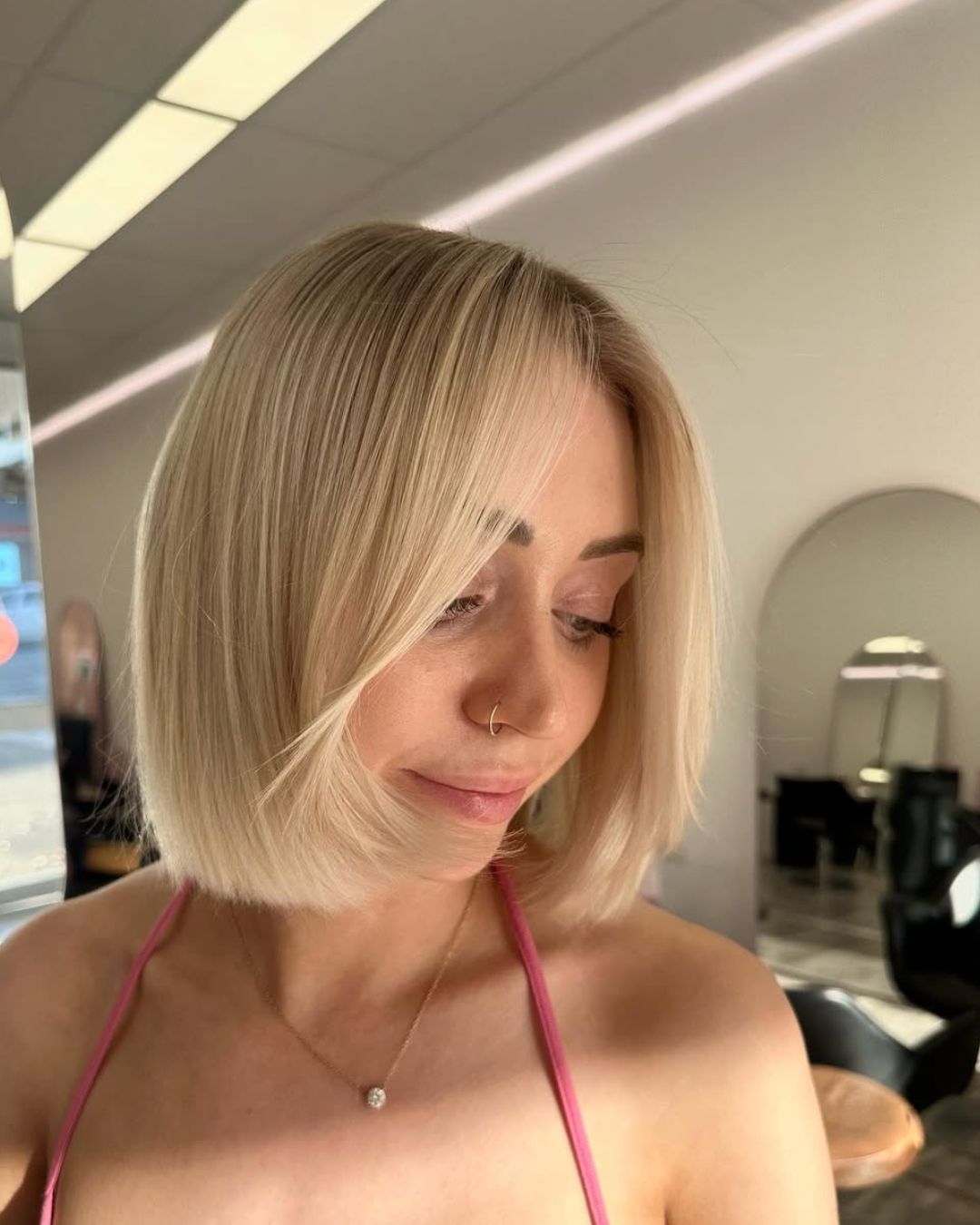 Polished Light Blonde Bob With Side Bangs — Blonde Short Hair