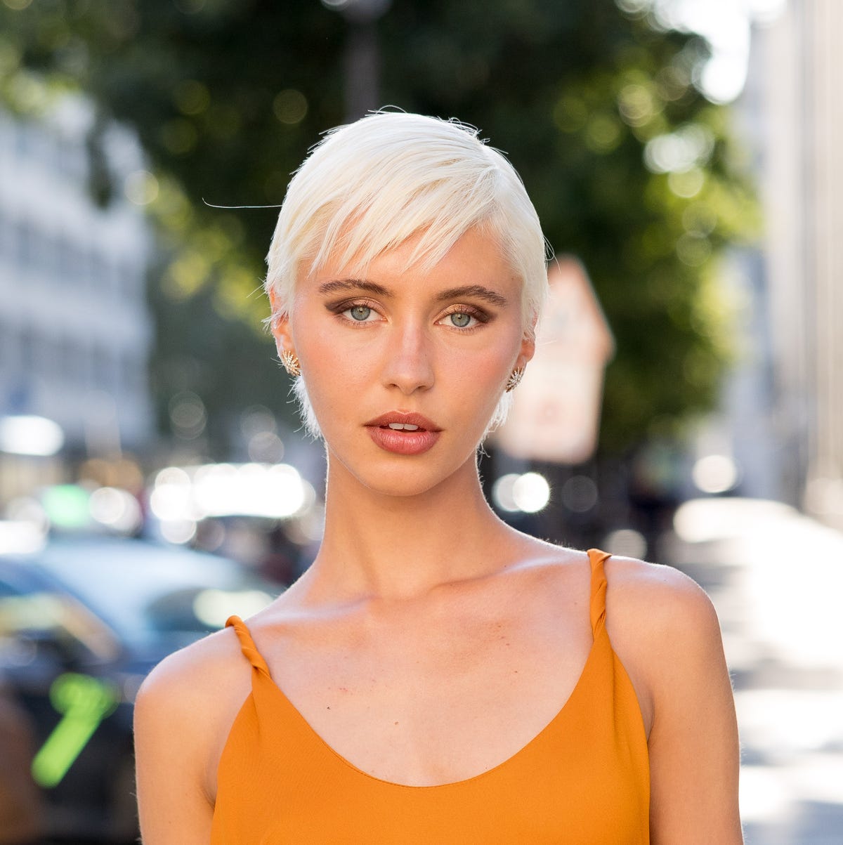 Platinum Pixie With Textured Side Layers, Ear — Blonde Short Hair