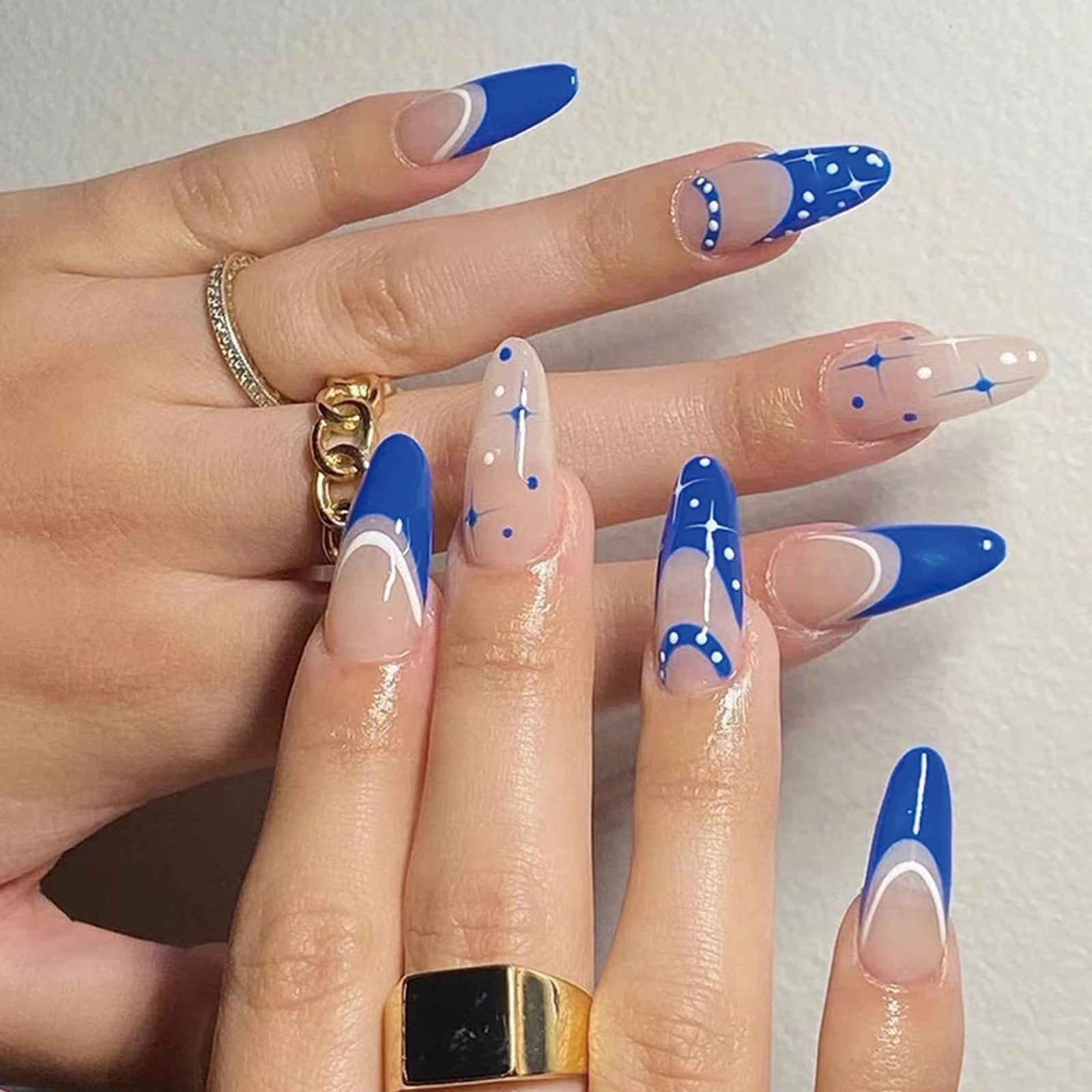 Bright Blue French Tip With Dots And Moons Short Almond Nails Bright Blue French Tip With Dots And Moons Short Almond Nails — Blue Almond Nails