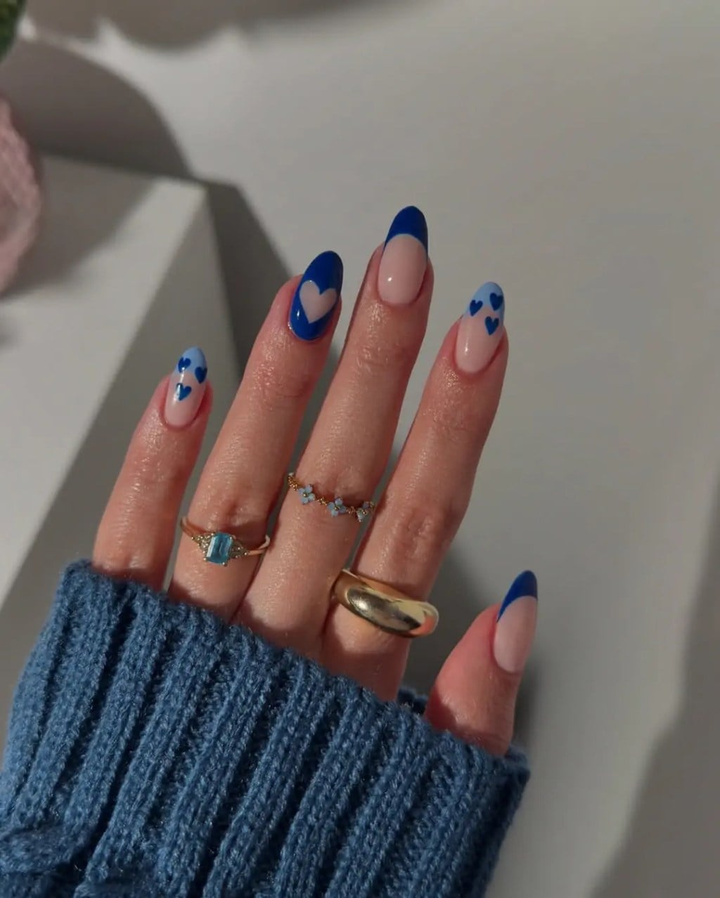 Bright Blue French Tip Heart Motif Medium Almond Nails Bright Blue French Tip Heart Motif Medium Almond Nails — Blue Almond Nails
