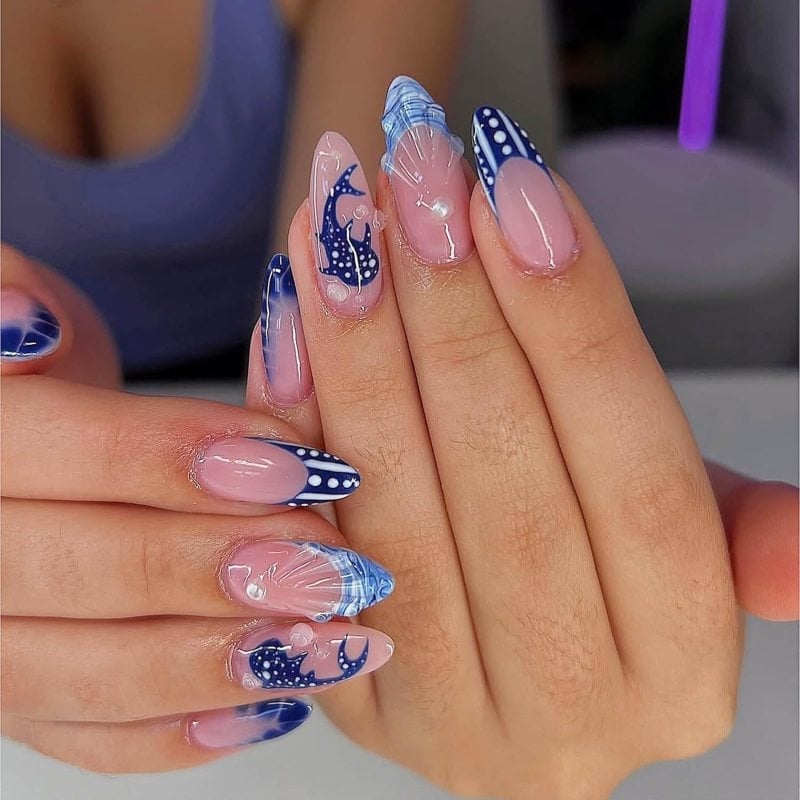 Sheer Pink Base Blue White Patterned Accent Long Almond Nails Sheer Pink Base Blue White Patterned Accent Long Almond Nails — Blue Almond Nails