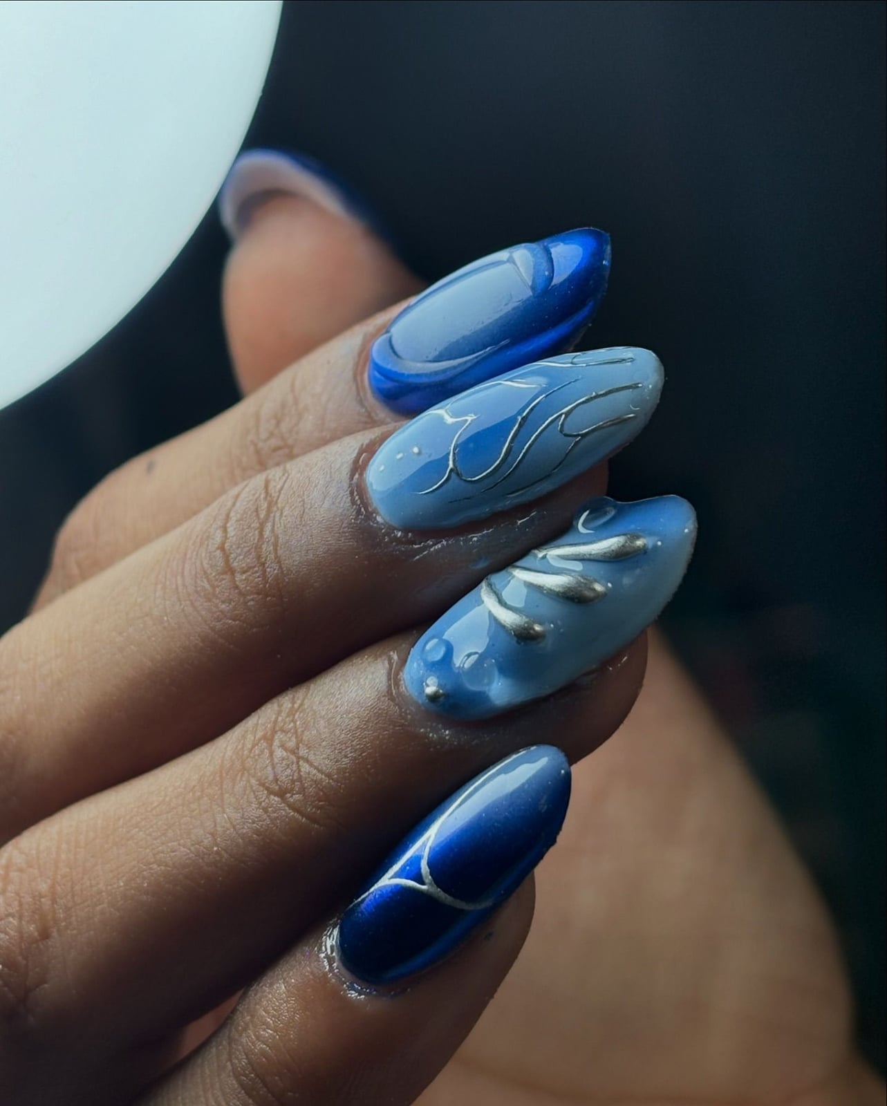 Various Blue Shades Silver Line Abstract Medium Almond Nails Various Blue Shades Silver Line Abstract Medium Almond Nails — Blue Almond Nails