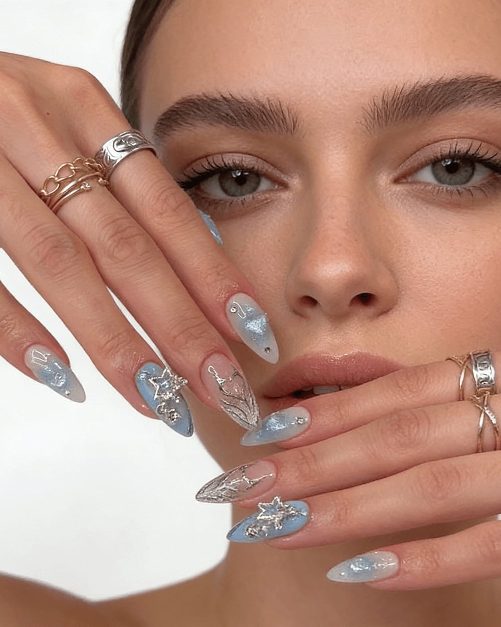 Glossy Light Periwinkle Blue Almond Nails With Small Rhinestones Glossy Light Periwinkle Blue Almond Nails With Small Rhinestones