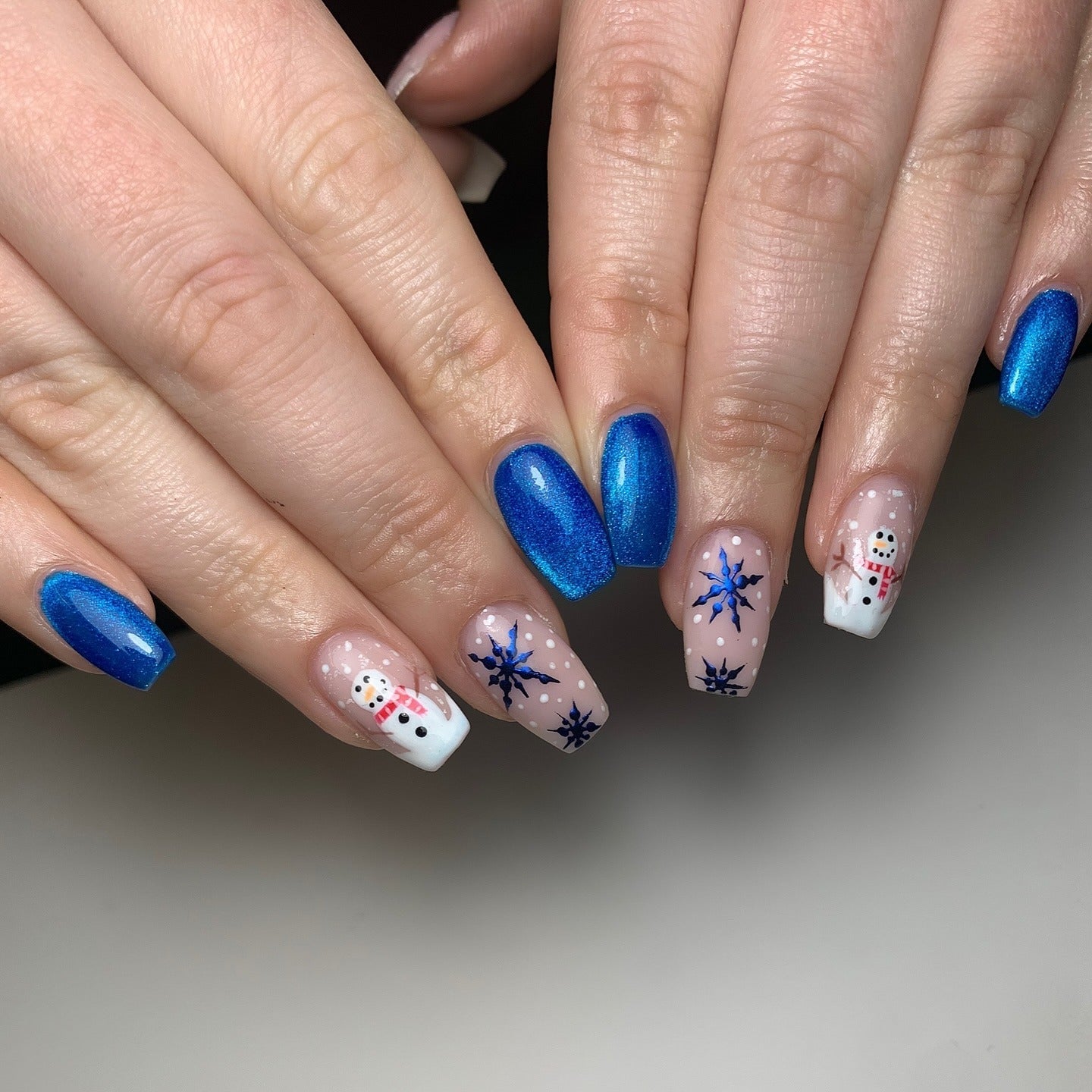 Medium Oval Blue Glitter French Snowflake Nails Medium Oval Blue Glitter French Snowflake Nails — Blue Christmas Nails