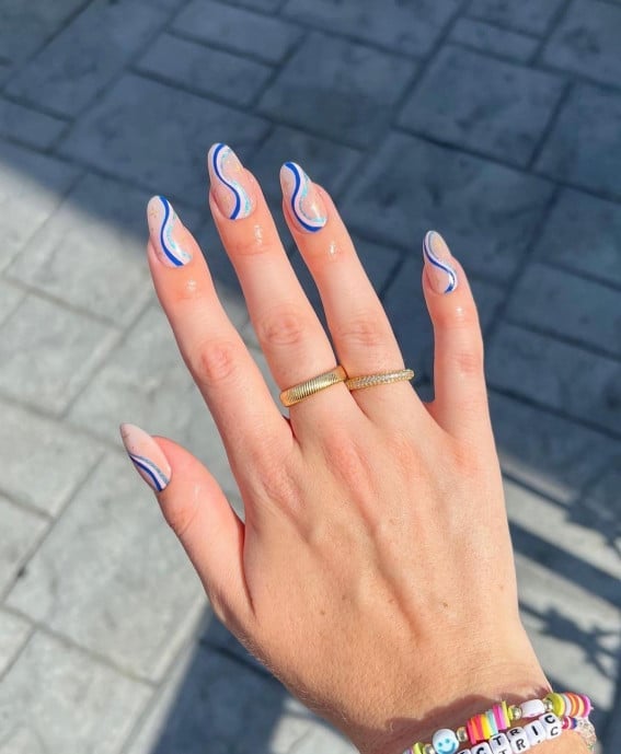 Long Almond Sheer Base with Bright Blue Wavy Lines Long Almond Sheer Base with Bright Blue Wavy Lines — Blue Nails
