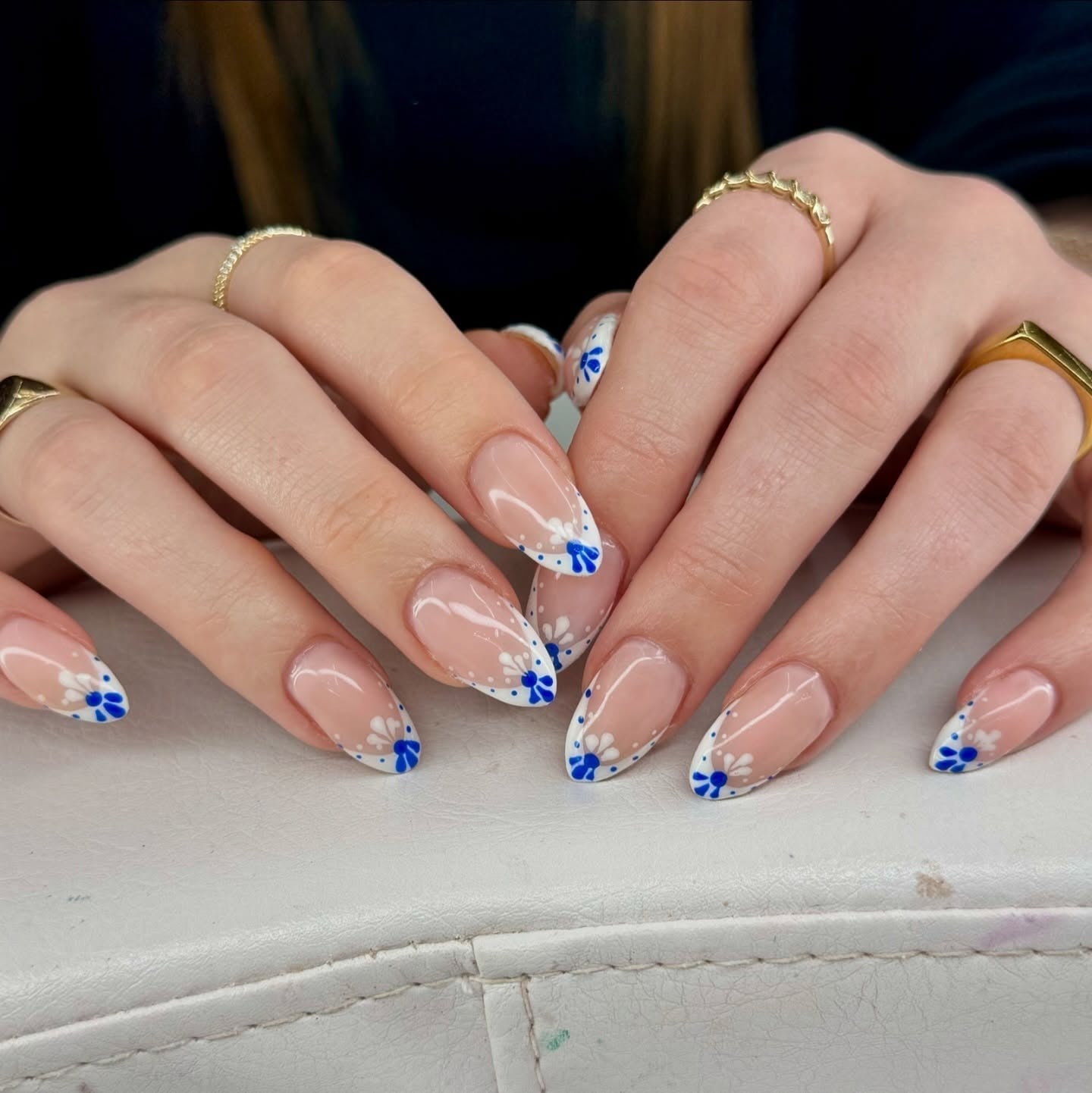 Short Almond French Tips with Blue Floral Accents Short Almond French Tips with Blue Floral Accents — Blue Nails