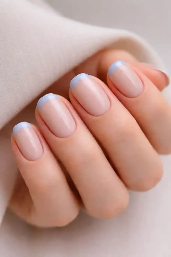 Short Almond Sheer Nude with Delicate Light Blue French Tips, Glossy Short Almond Sheer Nude with Delicate Light Blue French Tips, Glossy — Blue Nails