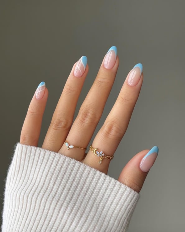 Sheer Nude with Light Blue French Tips Medium Almond Nails Sheer Nude with Light Blue French Tips Medium Almond Nails — Blue Nails