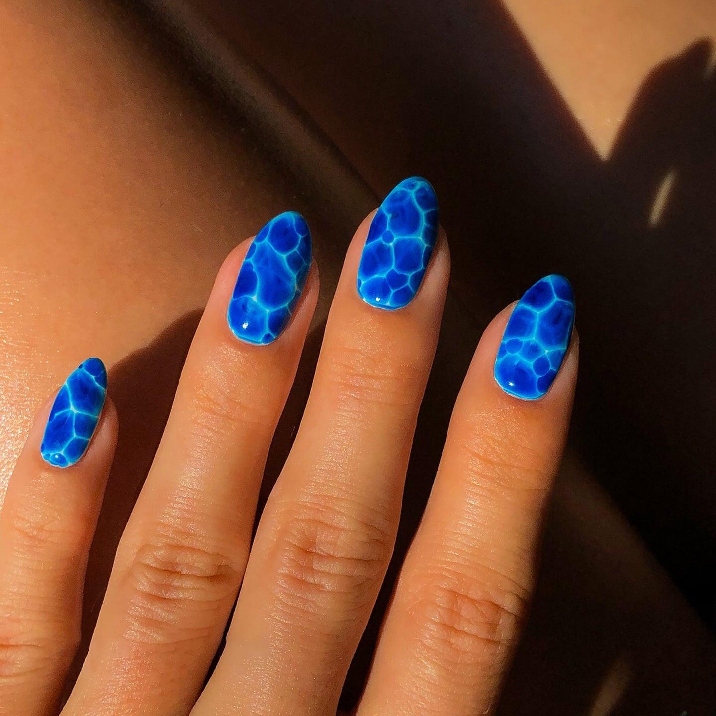 Bright Blue Water Texture Glossy Medium Oval Nails Bright Blue Water Texture Glossy Medium Oval Nails — Blue Nails