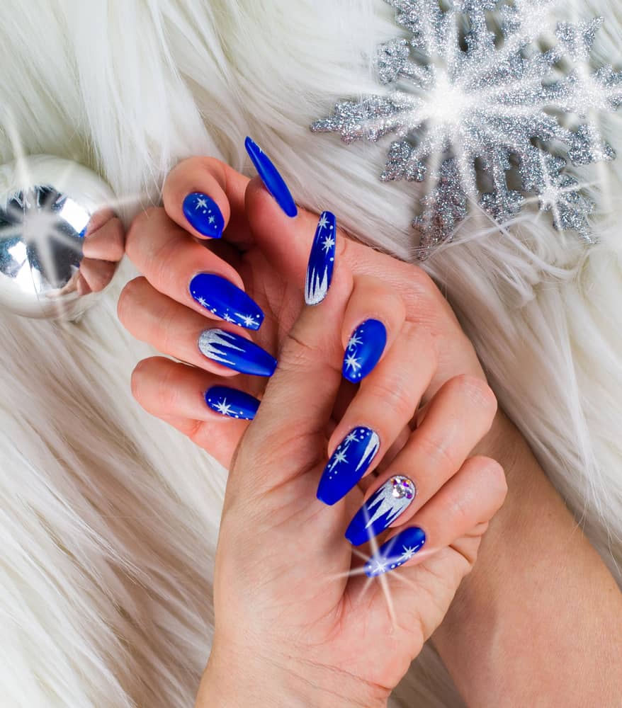 Long Stiletto Vibrant Blue Star Rhinestone Nails Long Stiletto Vibrant Blue Star Rhinestone Nails — Blue Winter Nails
