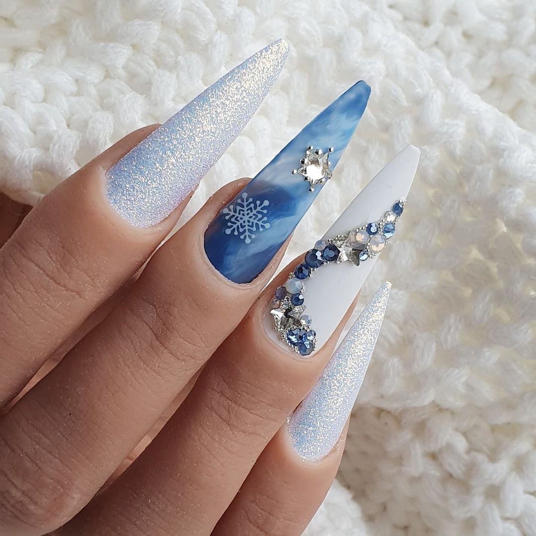 Long Stiletto Blue Glitter Marble Snowflake Nails Long Stiletto Blue Glitter Marble Snowflake Nails — Blue Winter Nails