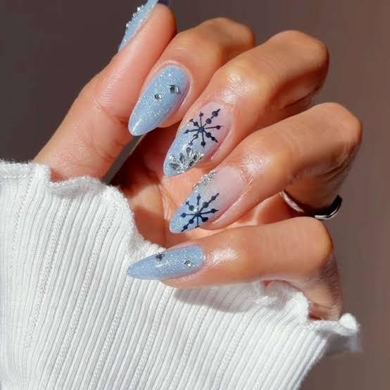Icy Blue Almond Nails with Frosted Snowflakes Icy Blue Almond Nails with Frosted Snowflakes — Blue Winter Nails