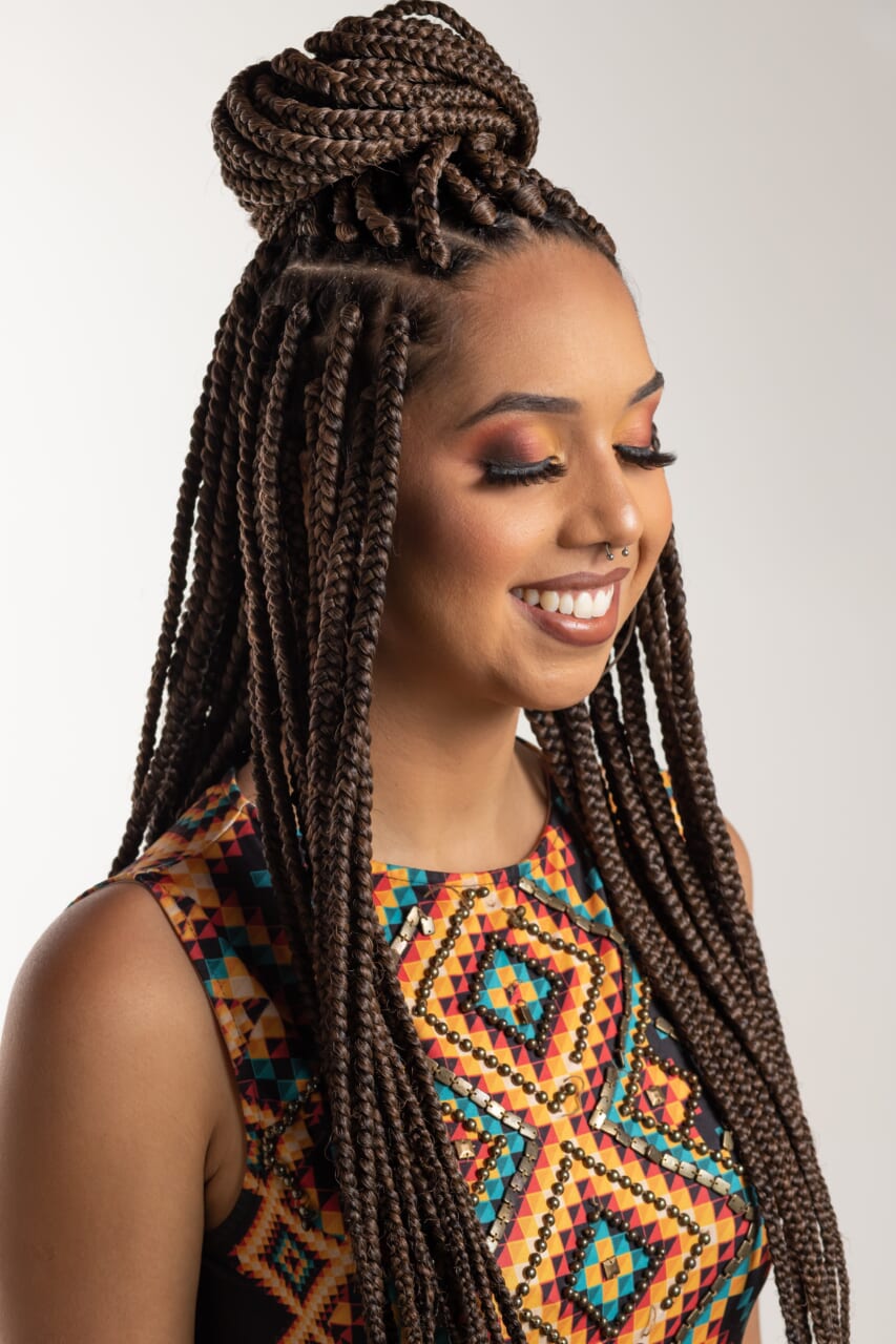 Mid-Back Dark Brown Box Braids In A High Bun
