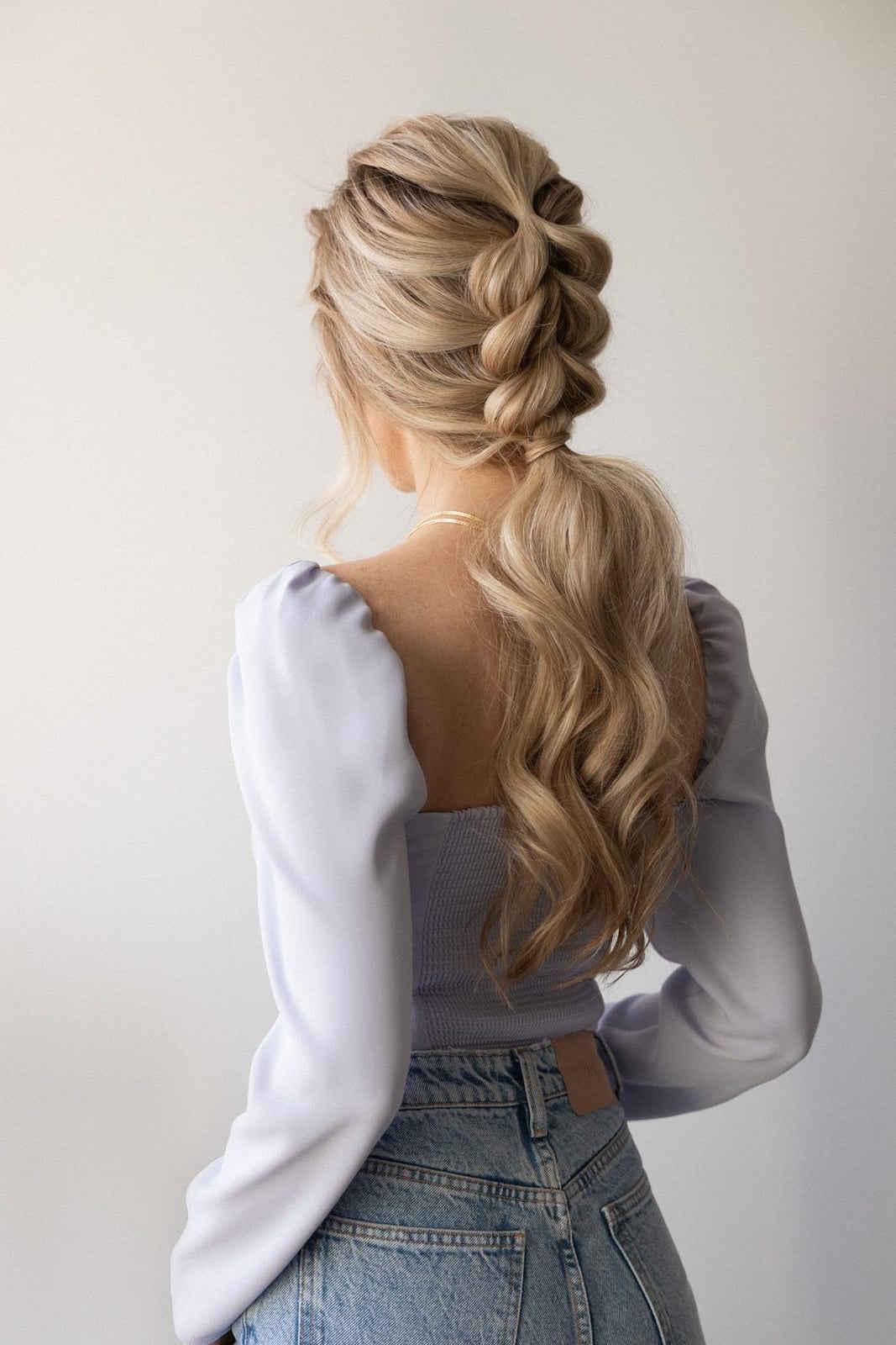 Blonde Ponytail With Dutch Braid and Loose Waves — Braided Ponytail