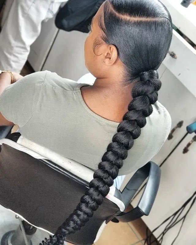 Braided Ponytail With Beads and Gold Accessories