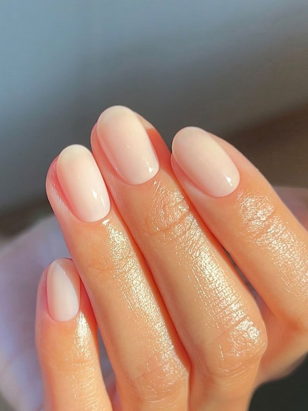 Glossy Milky White Short Oval Nails With Minimal Cuticle Art — Bridal Nails