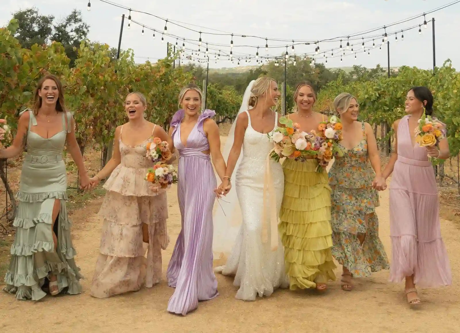 Pastel Flowing Dresses with Tiered Ruffles Pastel Flowing Dresses with Tiered Ruffles — Bridesmaid Dress