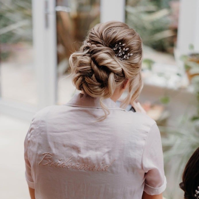 Blonde Braided Updo With Face-Framing Tendrils Blonde Braided Updo With Face-Framing Tendrils — Bridesmaid Hair