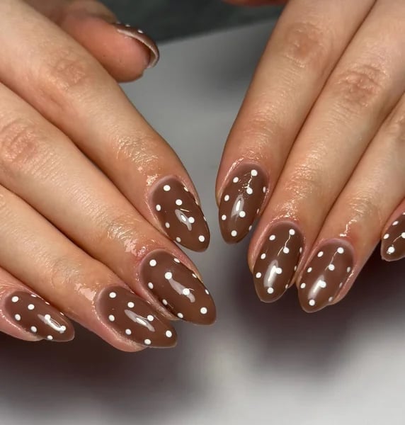 Glossy Brown Almond Nails with White Polka Dots Glossy Brown Almond Nails with White Polka Dots
